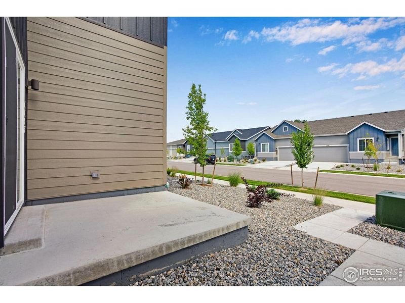 Exterior details and patio area of a home in Westside Crossing, Berthoud (Image 4).