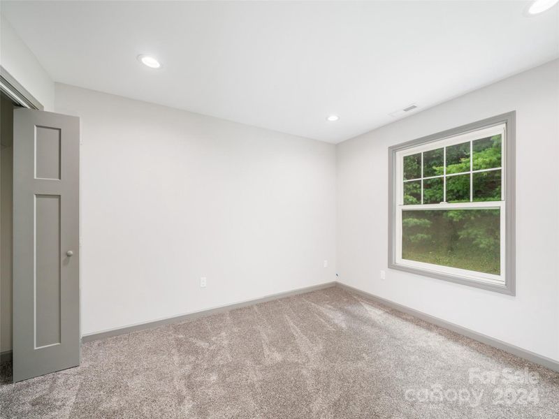 Guest Bedroom #3 to the rear of home Guest Bedroom #3 to the rear of home