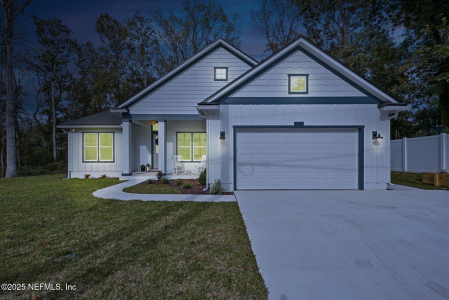 Front exterior of a new home in , Jacksonville, FL, highlighting curb appeal (Image 2).