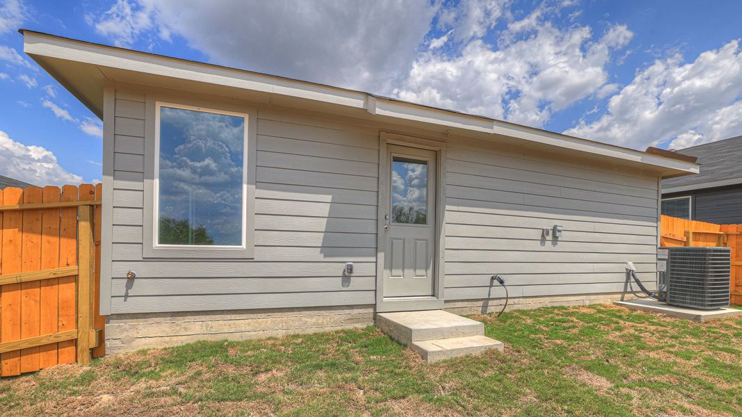 Representative exterior photo of a completed home built from the The Atlanta by D.R. Horton in Navarro Fields, Seguin, TX (Image 18).