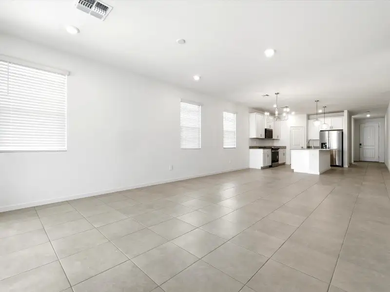 Spacious, unfurnished interior of a new home in Bella Vista Farms Estate Series, San Tan Valley (Image 7).