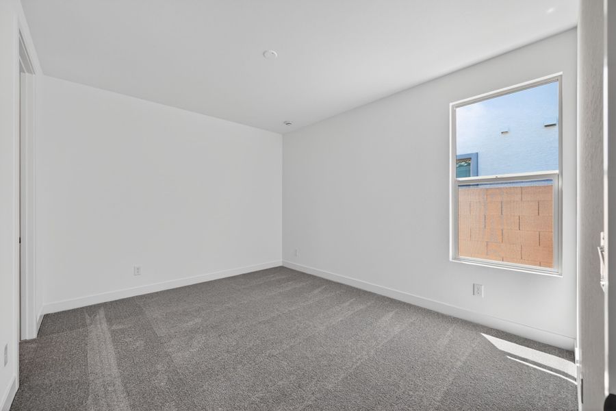 Spacious, unfurnished interior of a new home in Artisan at Asante, Surprise (Image 17).