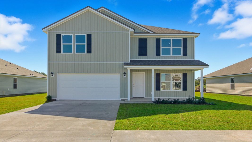 Front exterior of a new home in Wesley Park, Crawfordville, FL, highlighting curb appeal (Image 1). Front exterior of a new home in Wesley Park, Crawfordville, FL, highlighting curb appeal (Image 1).