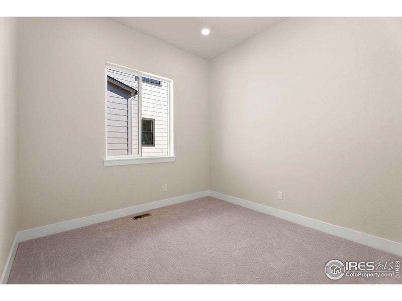 Spacious, unfurnished interior of a new home in Festival at RainDance, Windsor (Image 13).