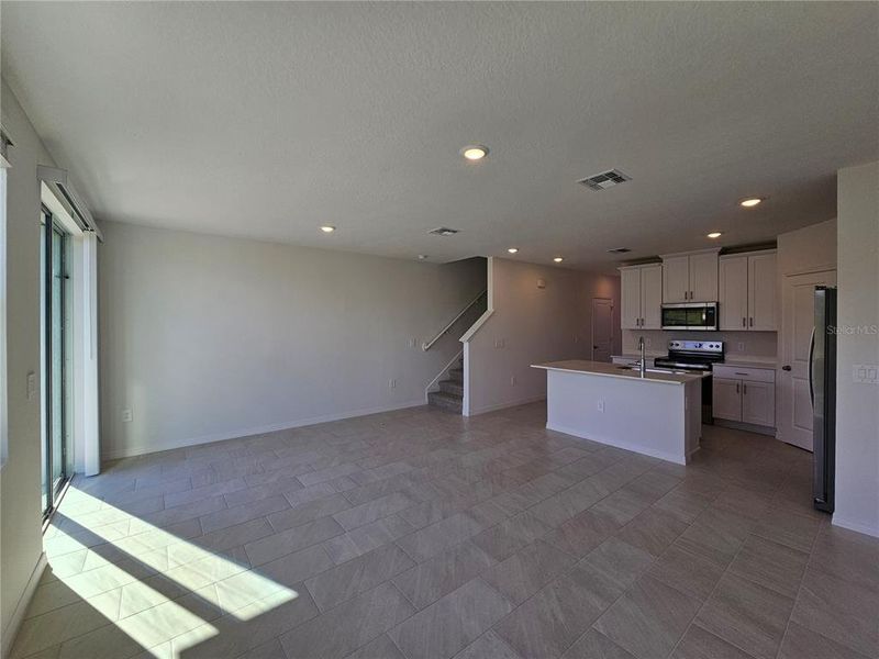 Spacious, unfurnished interior of a new home in The Reserve at Hammock Oaks Townes, Lady Lake (Image 11). Spacious, unfurnished interior of a new home in The Reserve at Hammock Oaks Townes, Lady Lake (Image 11).
