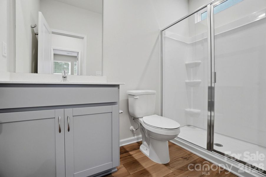 Furnished interior view inside a new home in Waxhaw Landing, Monroe (Image 15).