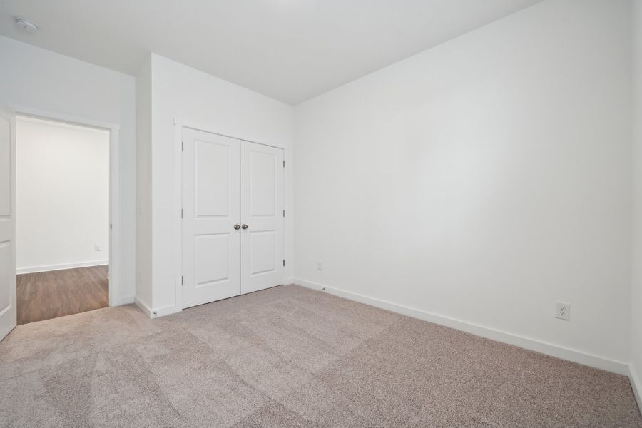 A room with white doors.
