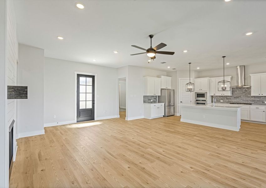 The spacious living room has plenty of space for large furniture. The spacious living room has plenty of space for large furniture.