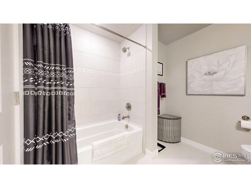 Furnished interior view inside a new home in The Lakes at Centerra - Discovery, Loveland (Image 15).