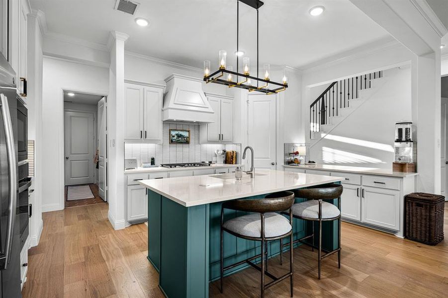 Another view of the kitchen and here you can see the hallway to the garage. Another view of the kitchen and here you can see the hallway to the garage.