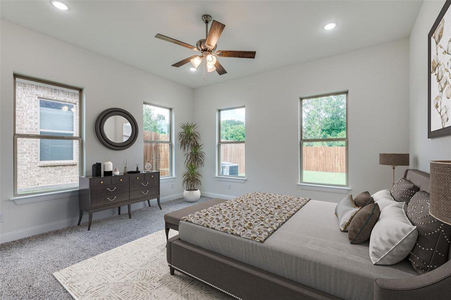 Virtually Staged for Illustrative Purposes.
Bedroom featuring light colored carpet and ceiling fan