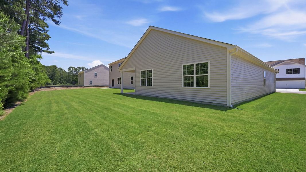 Exterior details and patio area of a home in Ridgewood Farms, Winterville (Image 19). Exterior details and patio area of a home in Ridgewood Farms, Winterville (Image 19).