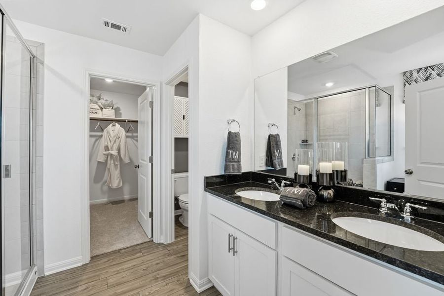 Representative furnished interior of a home built from the Harrier by Taylor Morrison in Longview, Del Valle (Image 13).