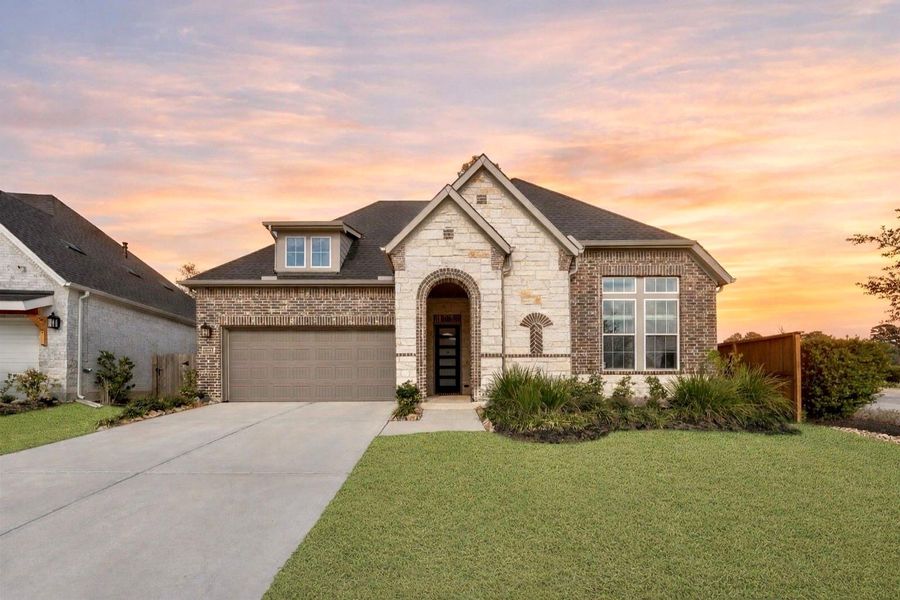 Front exterior of a new home in , Tomball, TX, highlighting curb appeal (Image 22).