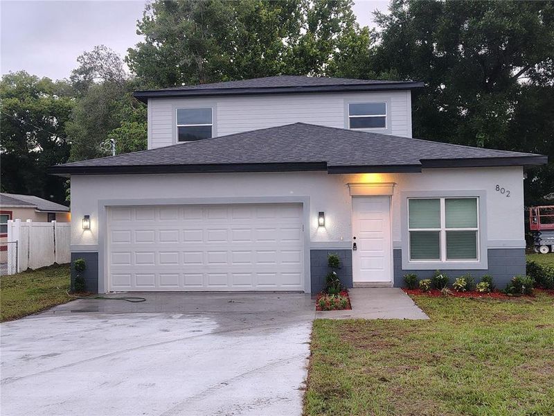 Front exterior of a new home in , Apopka, FL, highlighting curb appeal (Image 2). Front exterior of a new home in , Apopka, FL, highlighting curb appeal (Image 2).