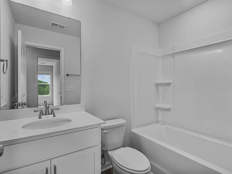 Furnished interior view inside a new home in Percival Village, Columbia (Image 6).