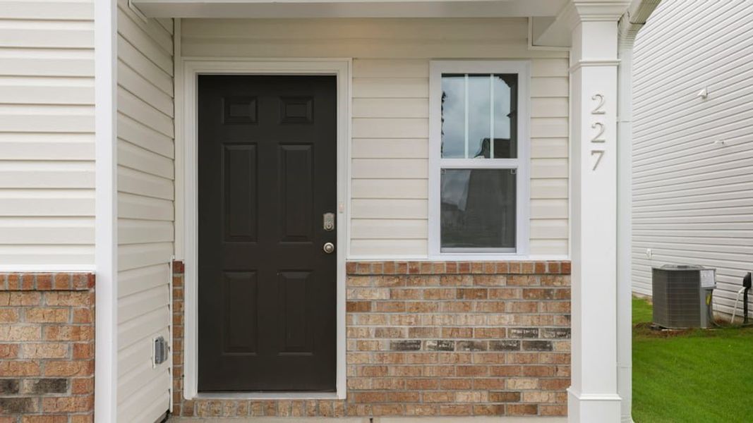 Exterior details and patio area of a home in Durbin Meadows, Fountain Inn (Image 3).