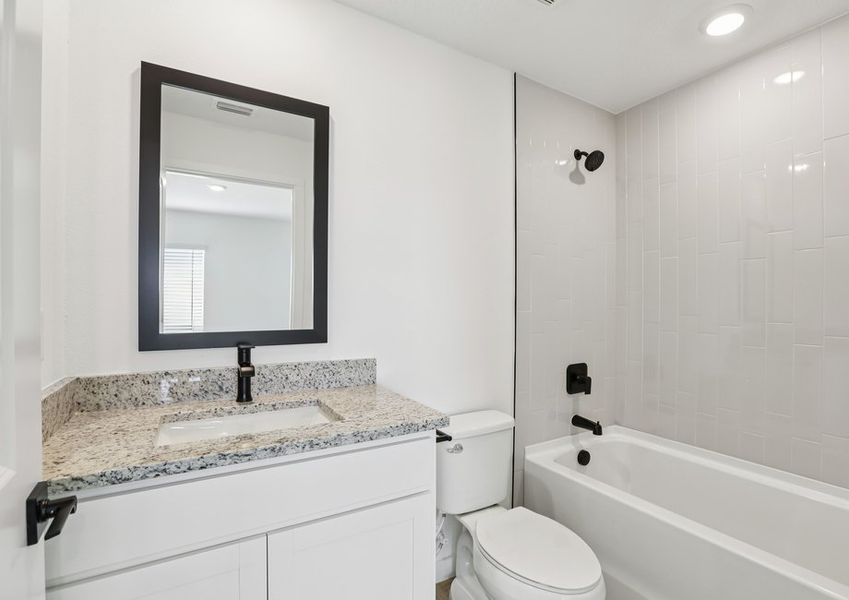 Get ready for your day in the master bathroom