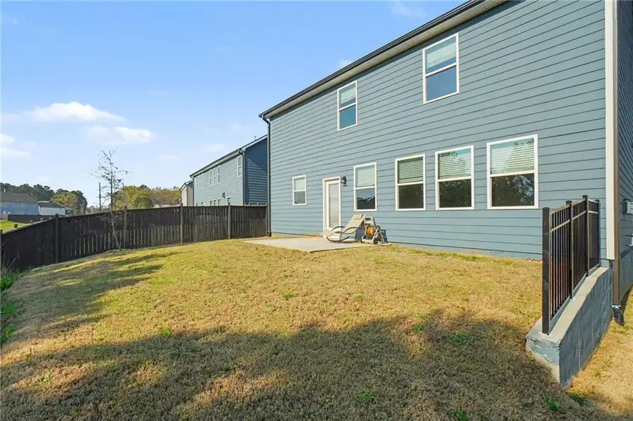 Exterior details and patio area of a home in , Austell (Image 3).