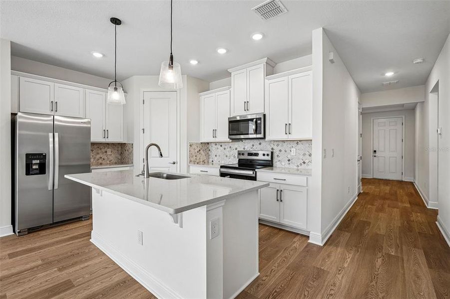 Furnished interior view inside a new home in Legends Preserve - Signature Series, Daytona Beach (Image 11).
