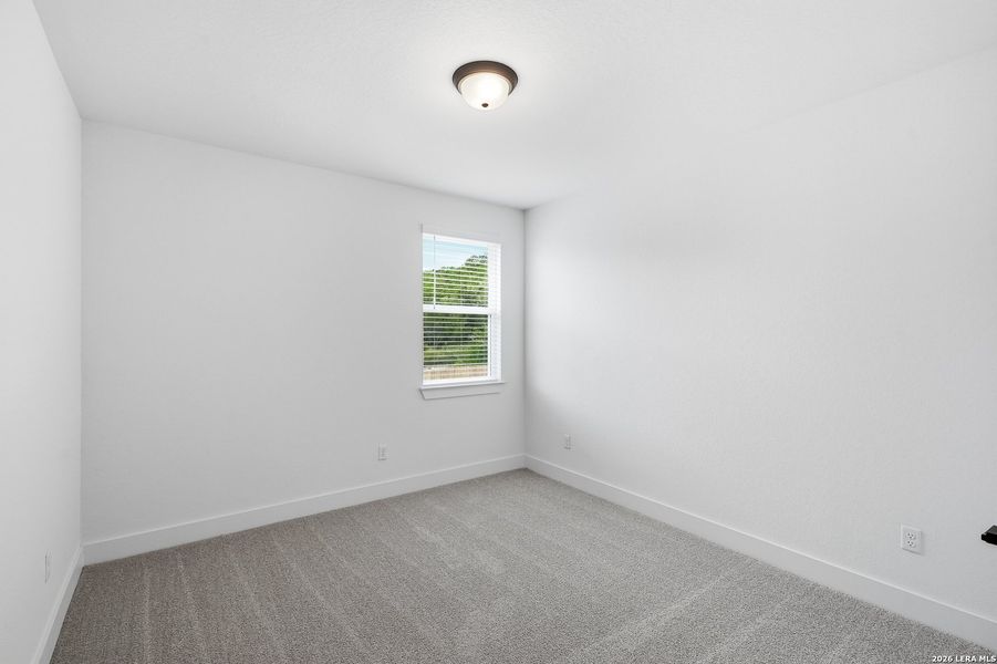 Spacious, unfurnished interior of a new home in The Reserve at Potranco Oaks, Castroville (Image 22).