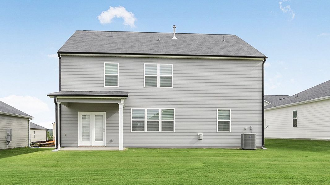 Exterior details and patio area of a home in Highland Hills, Graniteville (Image 2).
