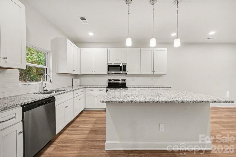 Furnished interior view inside a new home in , Newton (Image 9).