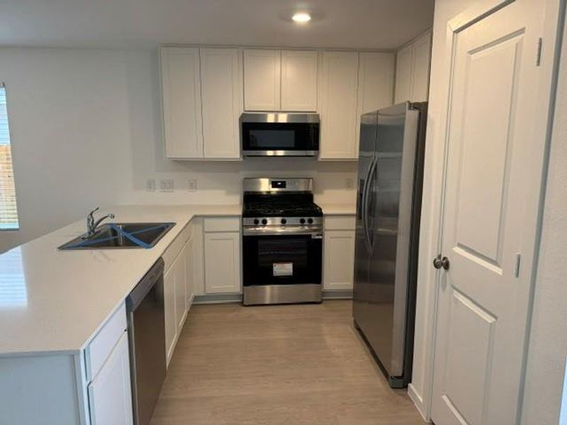 Furnished interior view inside a new home in , New Caney (Image 4).
