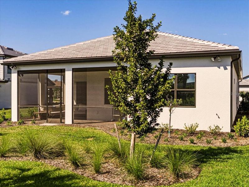 Exterior details and patio area of a home in Talon Preserve on Palmer Ranch, Nokomis (Image 30).