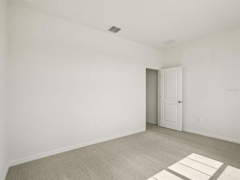 Spacious, unfurnished interior of a new home in Coasterra - Reserve Series, Palmetto (Image 39).