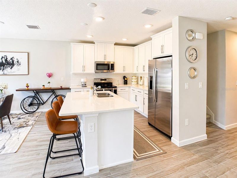 Furnished interior view inside a new home in , St. Cloud (Image 10).