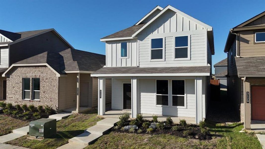 Front exterior of a new home in Orchard Village, Fort Worth, TX, highlighting curb appeal (Image 2). Front exterior of a new home in Orchard Village, Fort Worth, TX, highlighting curb appeal (Image 2).