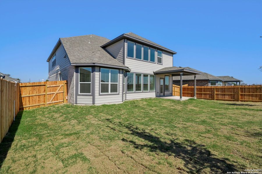 Exterior details and patio area of a home in Carmel Ranch, Schertz (Image 21).