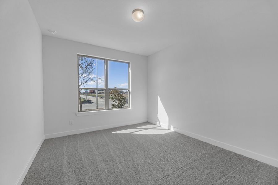 Spacious, unfurnished interior of a new home in Meridiana, Manvel (Image 17).