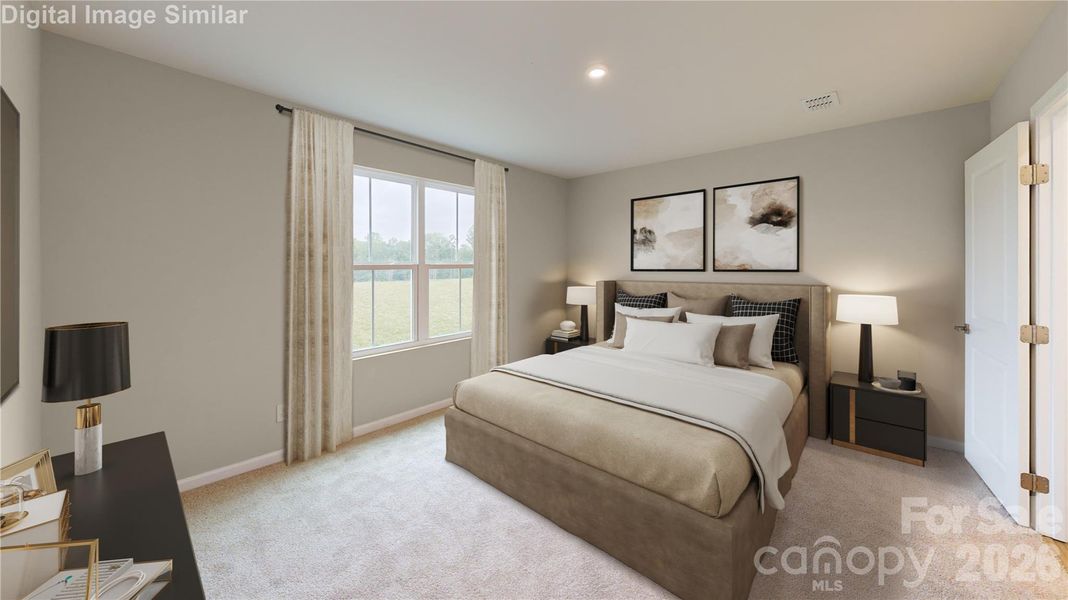 Secluded main-level owner's retreat offers ultimate privacy, complete with generous storage and a spacious walk-in closet for effortless organization.