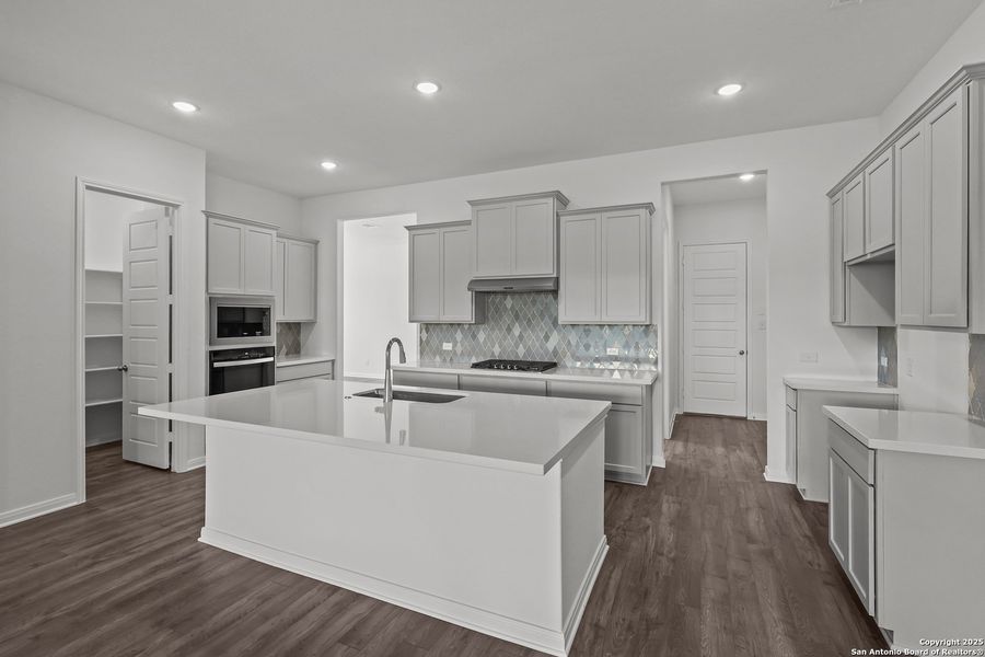 Furnished interior view inside a new home in Homestead 65', Schertz (Image 4).