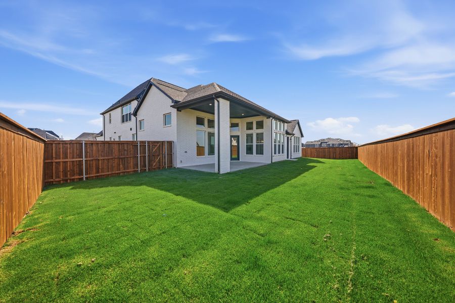 Exterior details and patio area of a home in Park Place - 80' Lots, Prosper (Image 4).