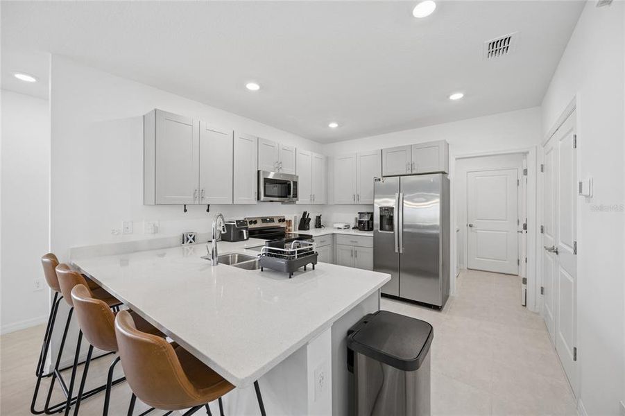Furnished interior view inside a new home in Westview Community Group Page, Kissimmee (Image 19).