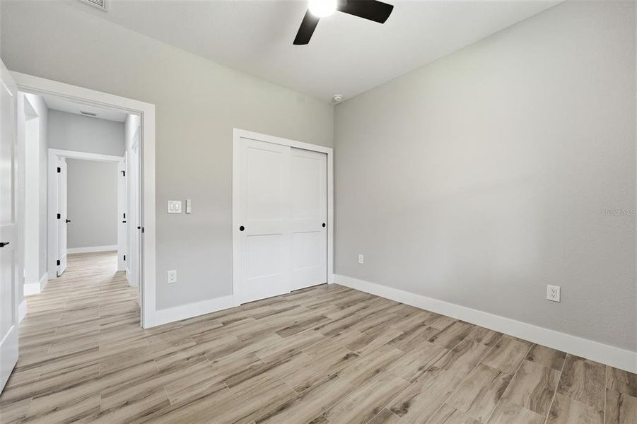 Spacious, unfurnished interior of a new home in , Port Charlotte (Image 27).