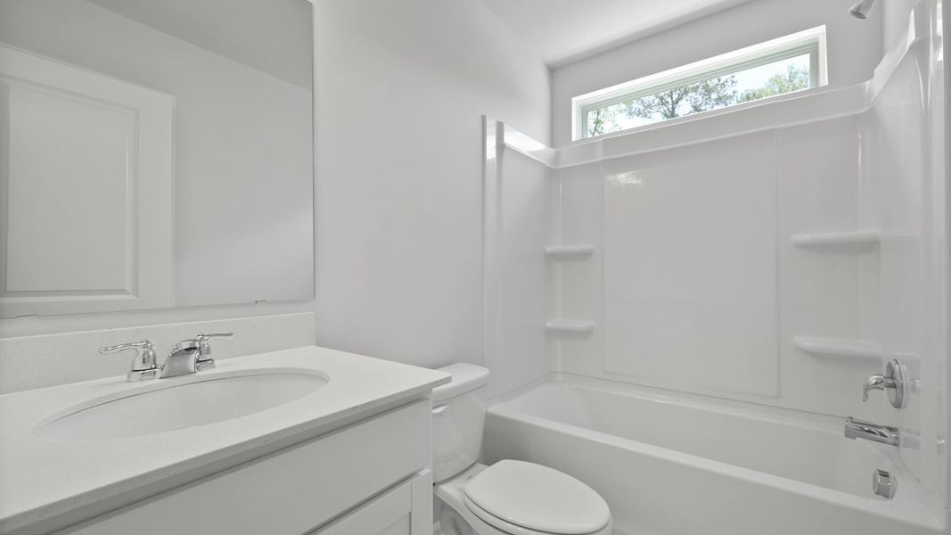Representative furnished interior of a home built from the FORRESTER by D.R. Horton in Founders Corner, Summerville (Image 9).