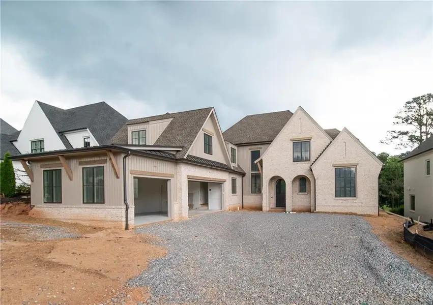 Front exterior of a new home in , Alpharetta, GA, highlighting curb appeal (Image 1). Front exterior of a new home in , Alpharetta, GA, highlighting curb appeal (Image 1).