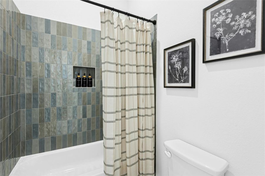 Full bathroom with shower / tub combo Full bathroom with shower / tub combo