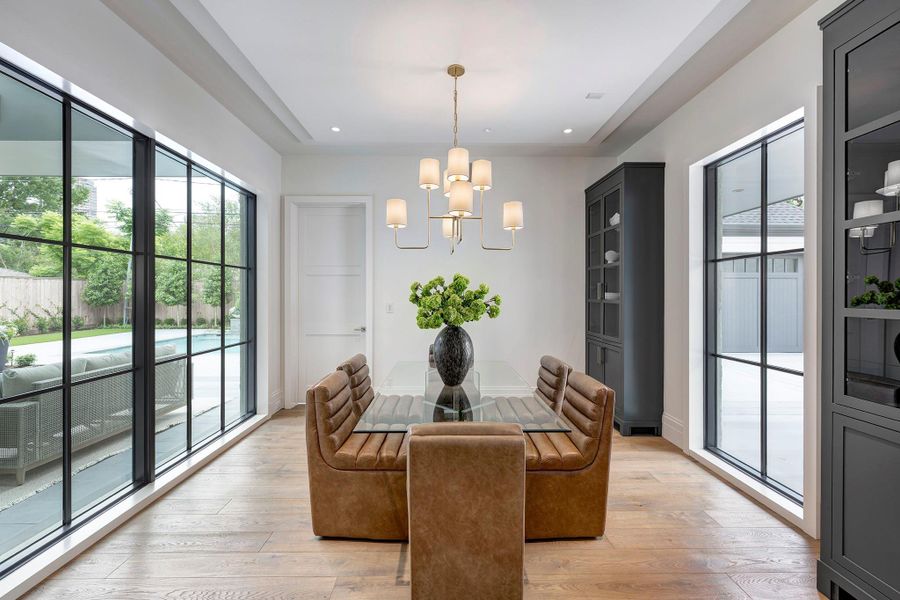 Dining room enjoys views of the covered patio area.
