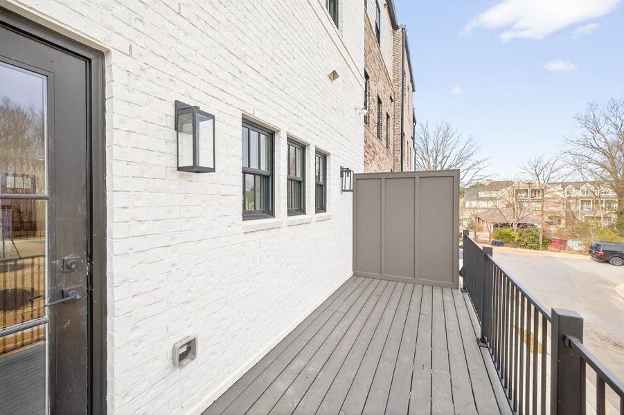 Exterior details and patio area of a home in Skyview On Broad, Sugar Hill (Image 19).