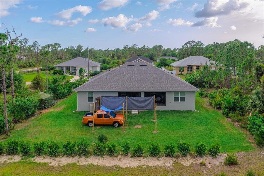 Exterior details and patio area of a home in , Port Charlotte (Image 26).