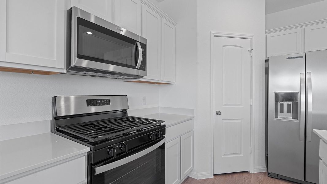 Furnished interior view inside a new home in Carillon, Manor (Image 5).