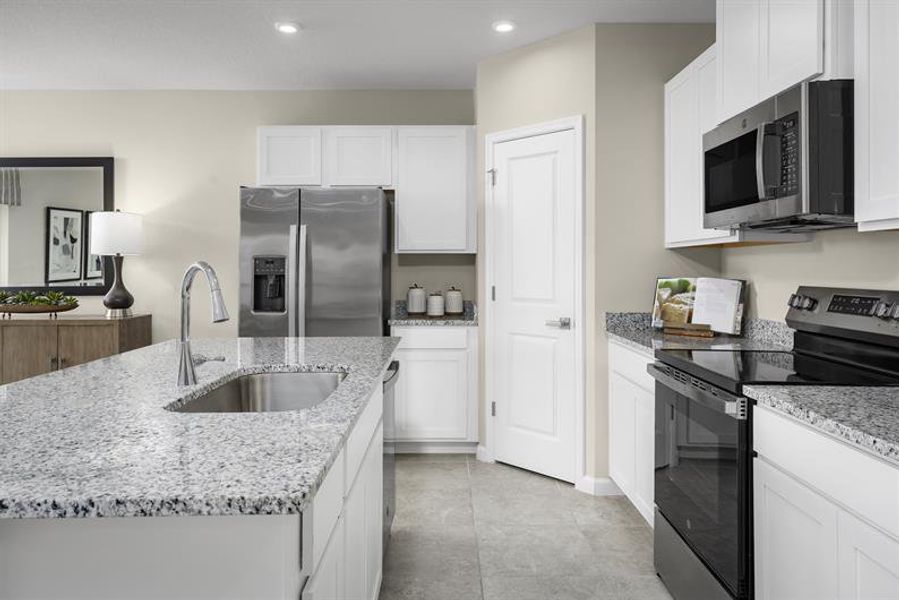 Representative furnished interior of a home built from the Palm by Ryan Homes in Touchstone, Lakeland (Image 2).