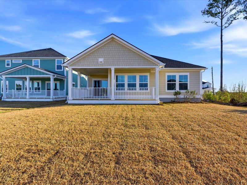 Exterior details and patio area of a home in The Coves at Lakes of Cane Bay, Summerville (Image 27). Exterior details and patio area of a home in The Coves at Lakes of Cane Bay, Summerville (Image 27).