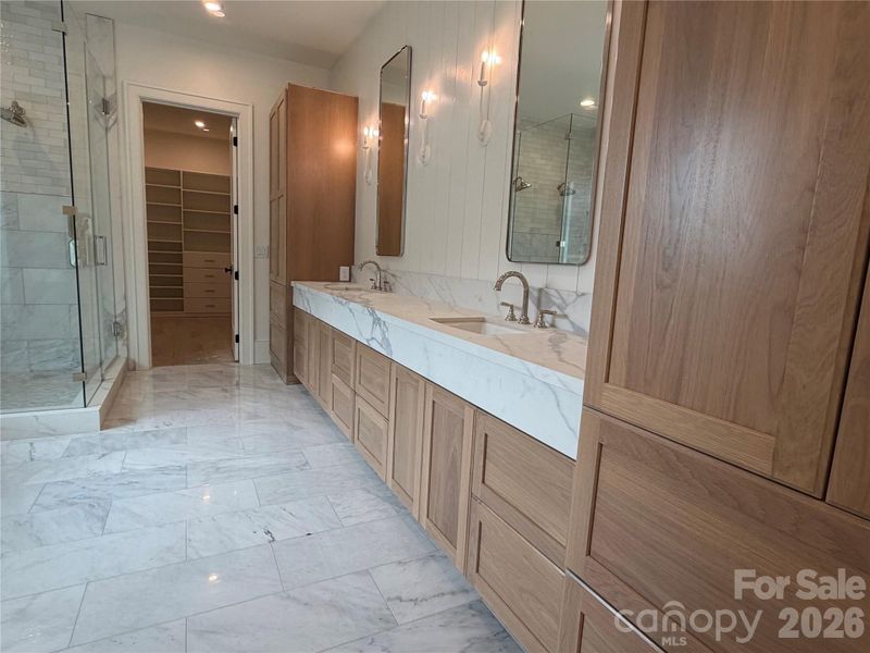 Primary Bathroom with 17 feet of cabinetry.