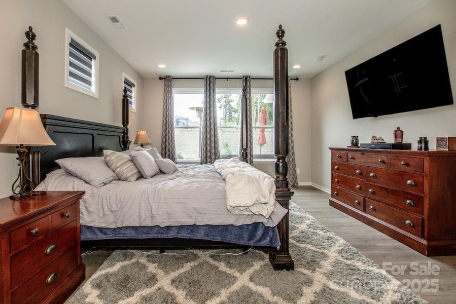 Furnished interior view inside a new home in Signature at Reid's Cove, Mooresville (Image 22).